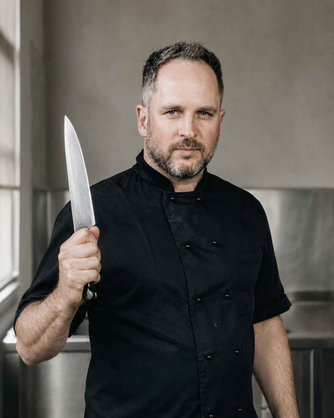 Founder portrait, in the kitchen